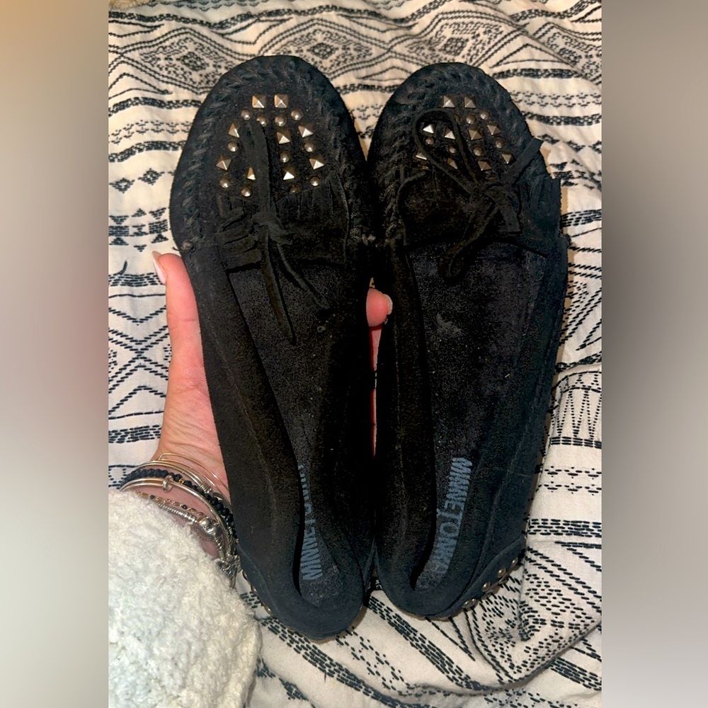 Black deer skin Minnetonka  studded  flats / moccasins.